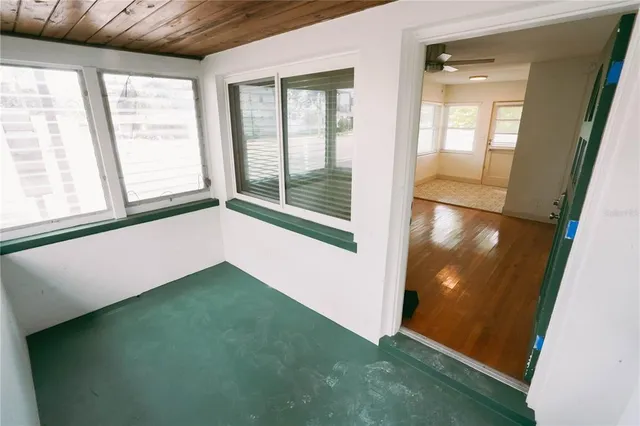 an empty room with windows