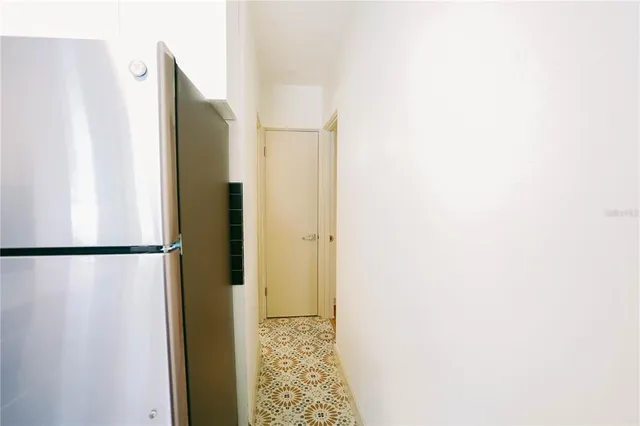 a view of walk in closet with rug