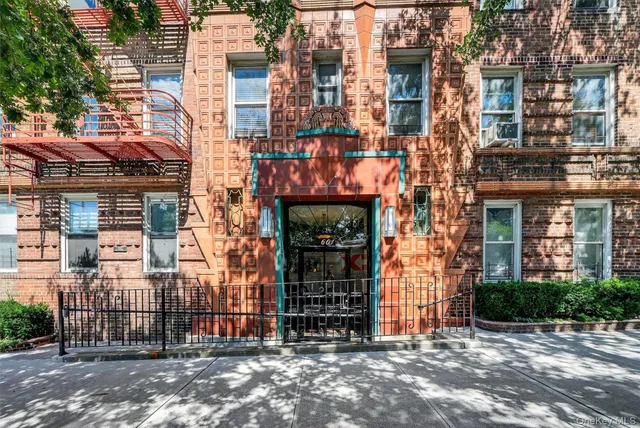 a view of a building with a street