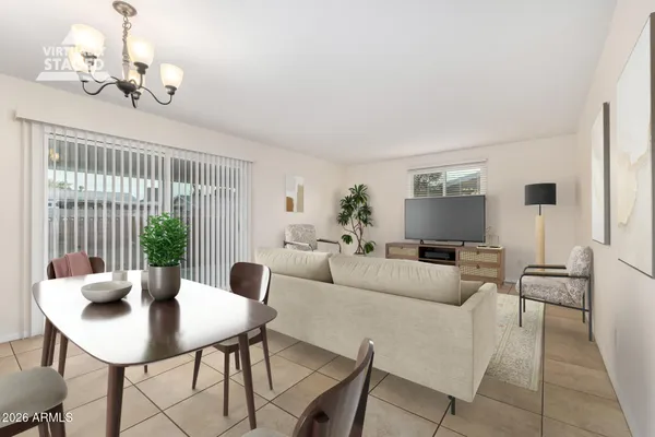 a view of an empty room and wooden floor