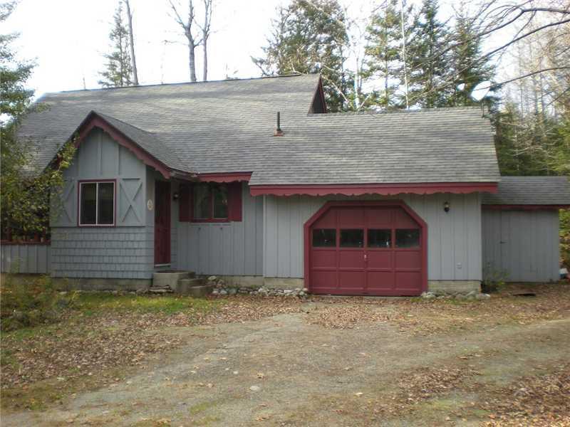 1013 Poplar Stream Road Carrabassett Valley, ME 04947 - Photo 2 of 13 Exterior Front. garage and storage...