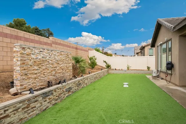 a view of a backyard with plants