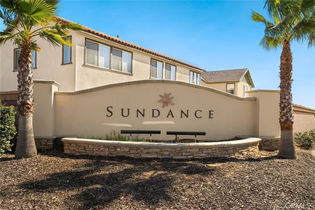 a view of a swimming pool with chairs