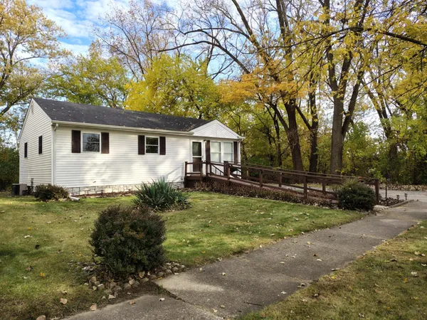 a front view of house with garden