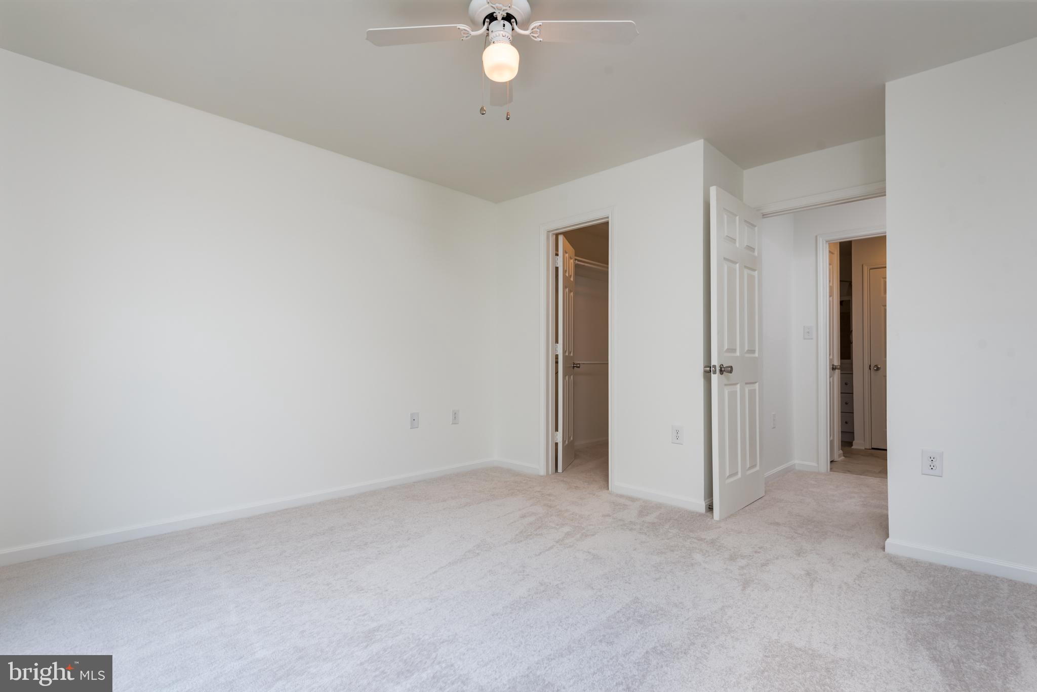 21007 Timber Ridge Terrace, Unit 301 Ashburn, VA 20147 - Photo 17 of 30 Primary bedroom has a walk-in closet