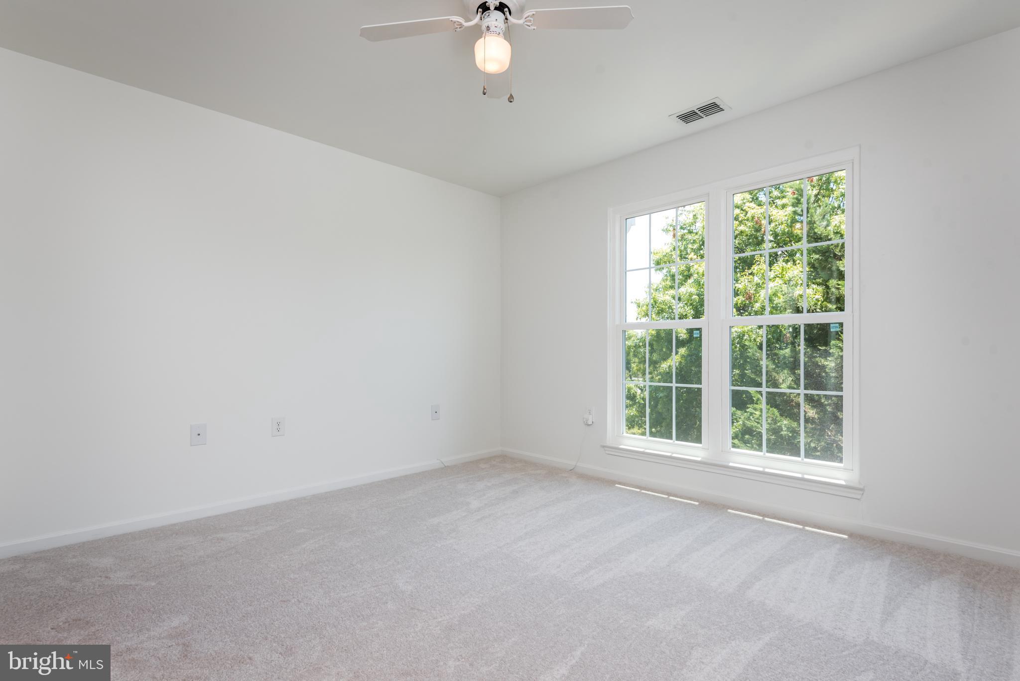 21007 Timber Ridge Terrace, Unit 301 Ashburn, VA 20147 - Photo 18 of 30 Primary bedroom view is very private