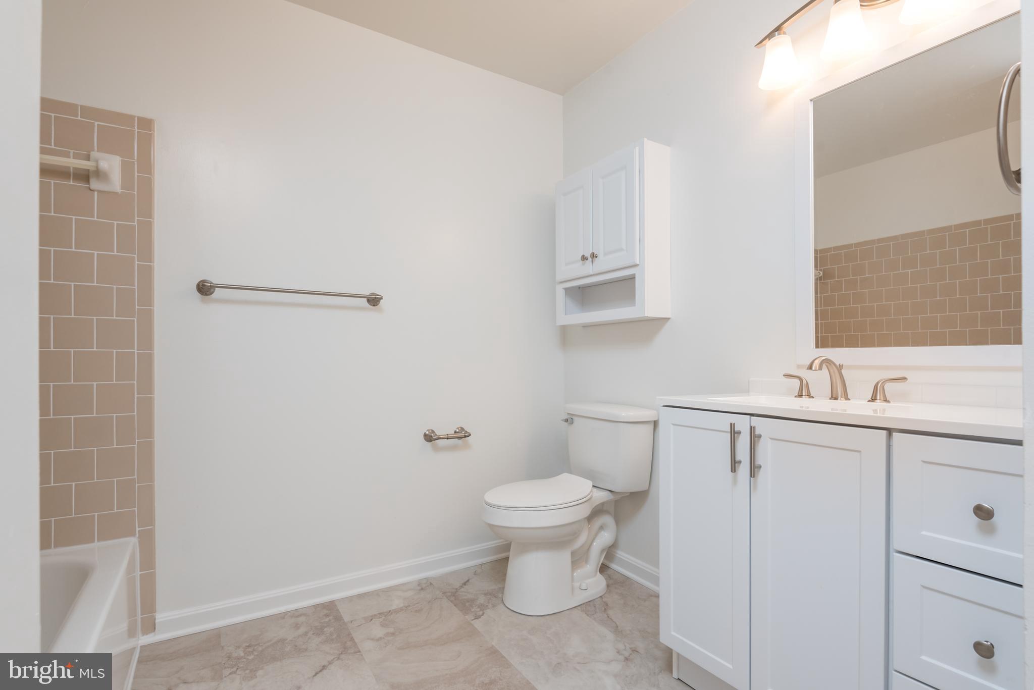 21007 Timber Ridge Terrace, Unit 301 Ashburn, VA 20147 - Photo 19 of 30 Large, updated full bath with high profile sink