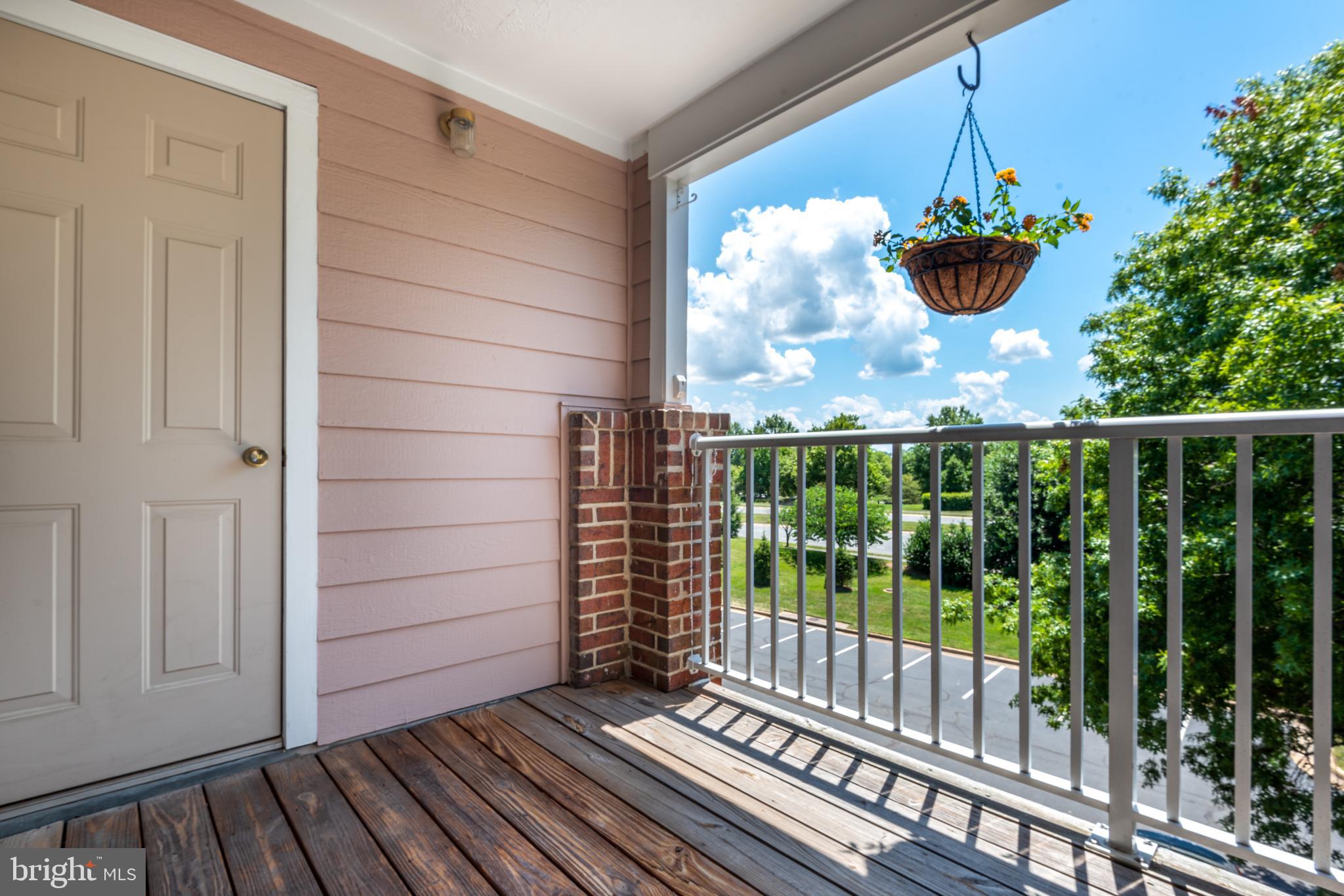 21007 Timber Ridge Terrace, Unit 301 Ashburn, VA 20147 - Photo 22 of 30 View from private balcony. Notice open parking.