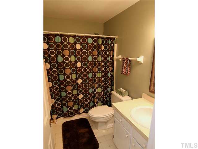 225 Glen Eden Road Durham, NC 27713 - Photo 13 of 18 The hall bathroom serves the two secondary bedrooms.