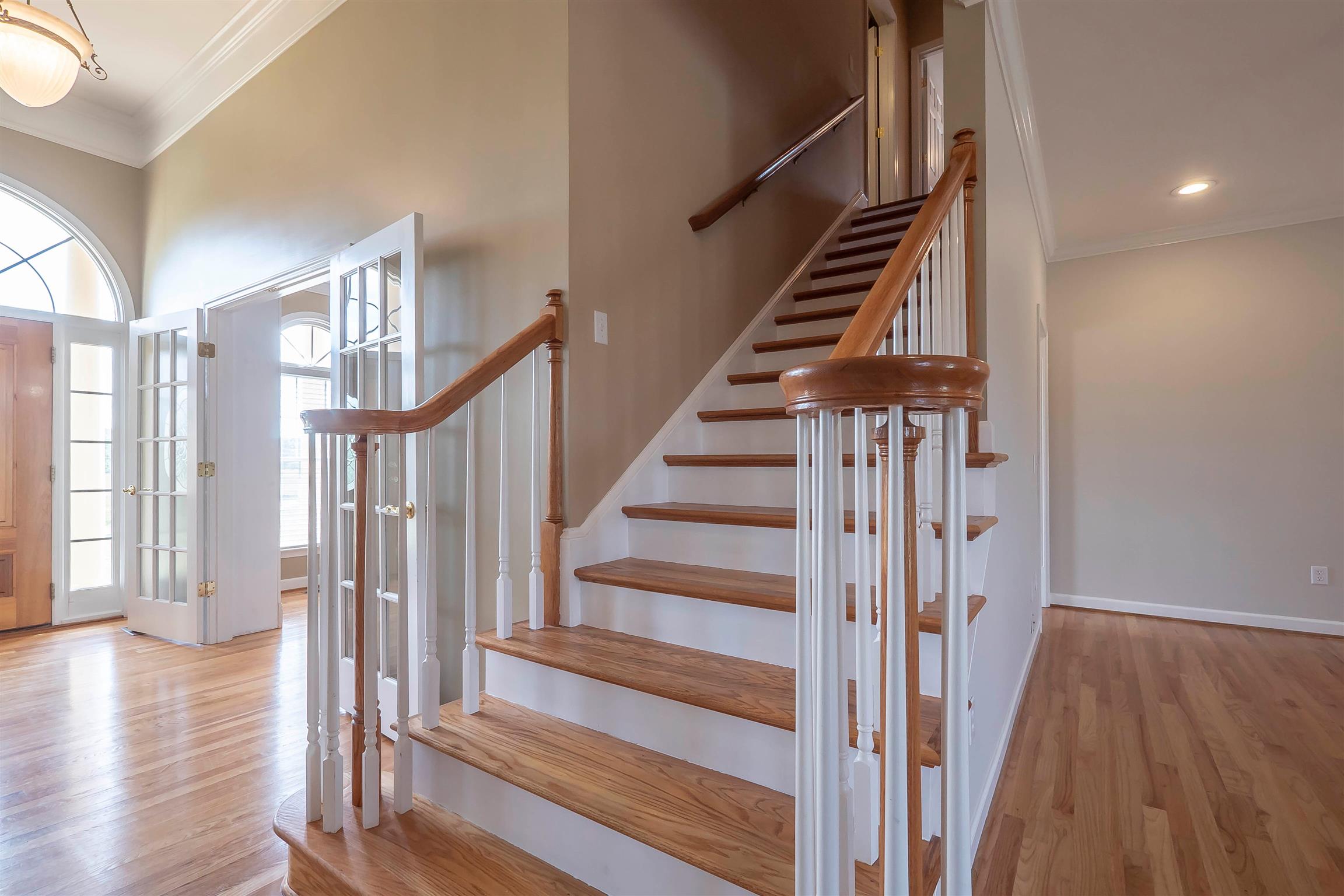 7722 Barnhill Road Primm Springs, TN 38476 - Photo 22 of 30 a view of a hallway with wooden floor and entryway