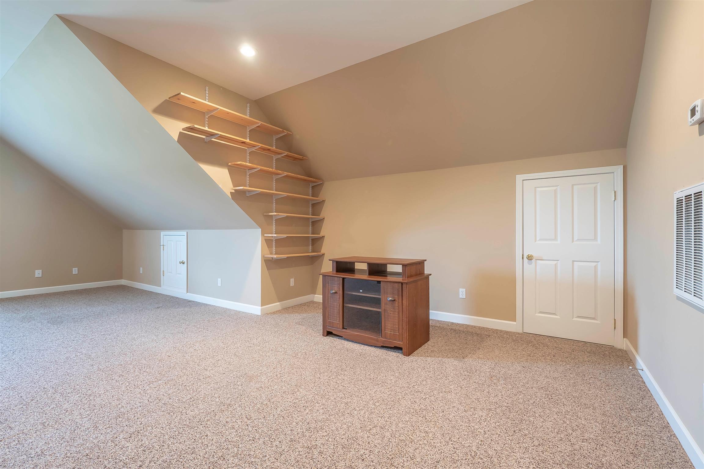 7722 Barnhill Road Primm Springs, TN 38476 - Photo 23 of 30 a view of livingroom and stairs