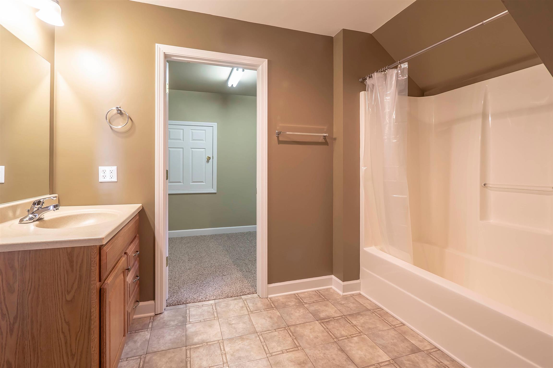 7722 Barnhill Road Primm Springs, TN 38476 - Photo 26 of 30 a bathroom with a sink and a mirror