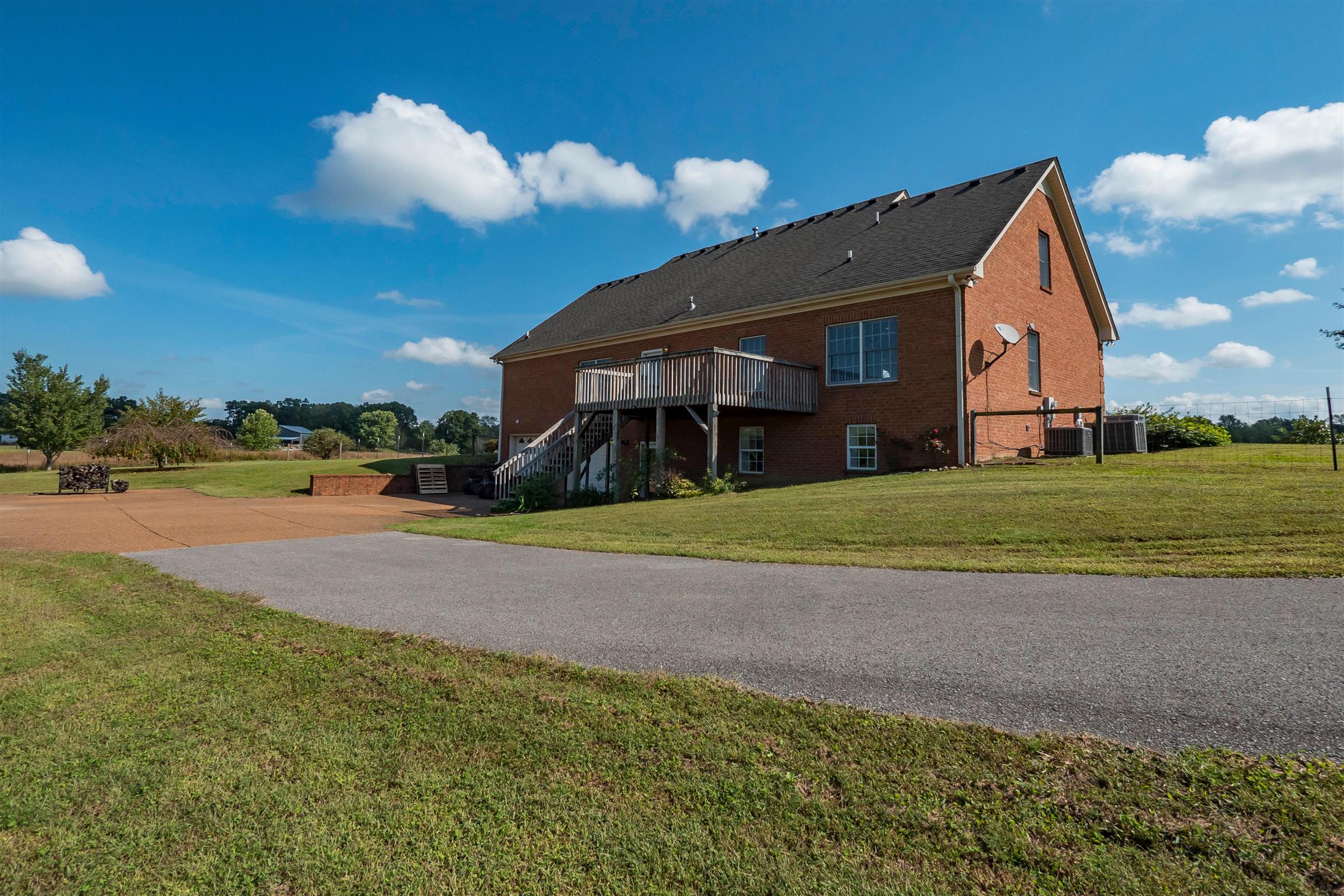 7722 Barnhill Road Primm Springs, TN 38476 - Photo 30 of 30 a view of a house with a yard