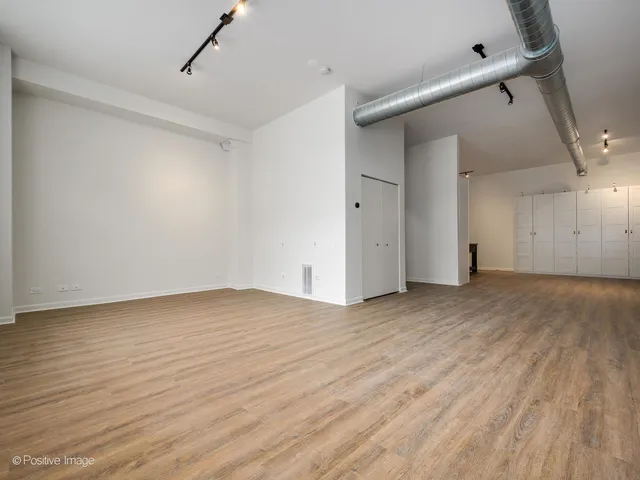 $310,000 | 2418 West Bloomingdale Avenue, Unit 102, Chicago, IL 60647
