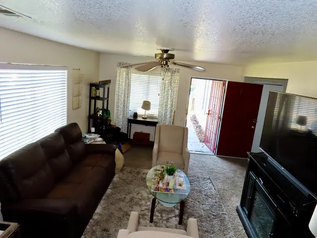 a kitchen with stainless steel appliances a refrigerator and a stove