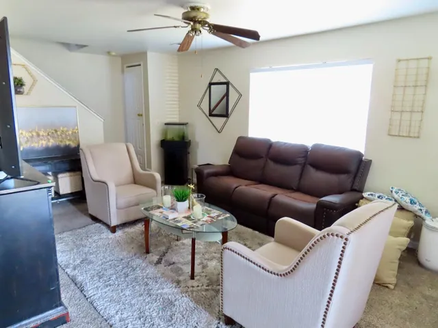 a kitchen with stainless steel appliances a refrigerator and a stove