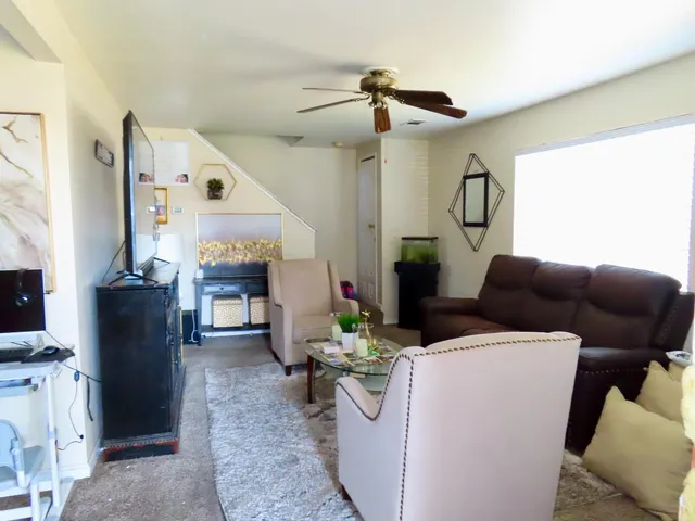 a kitchen with a stove a sink and a microwave