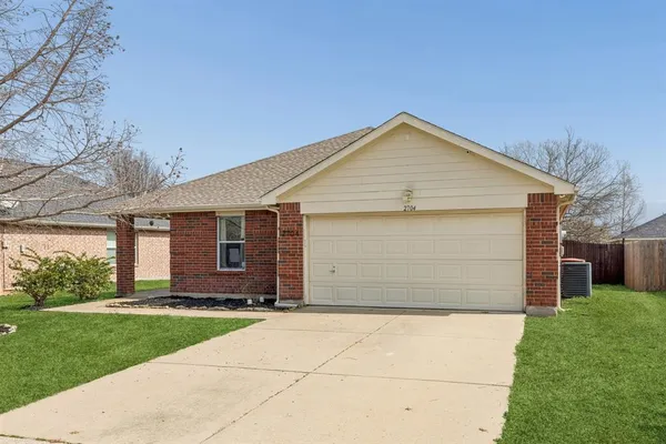a front view of house with yard