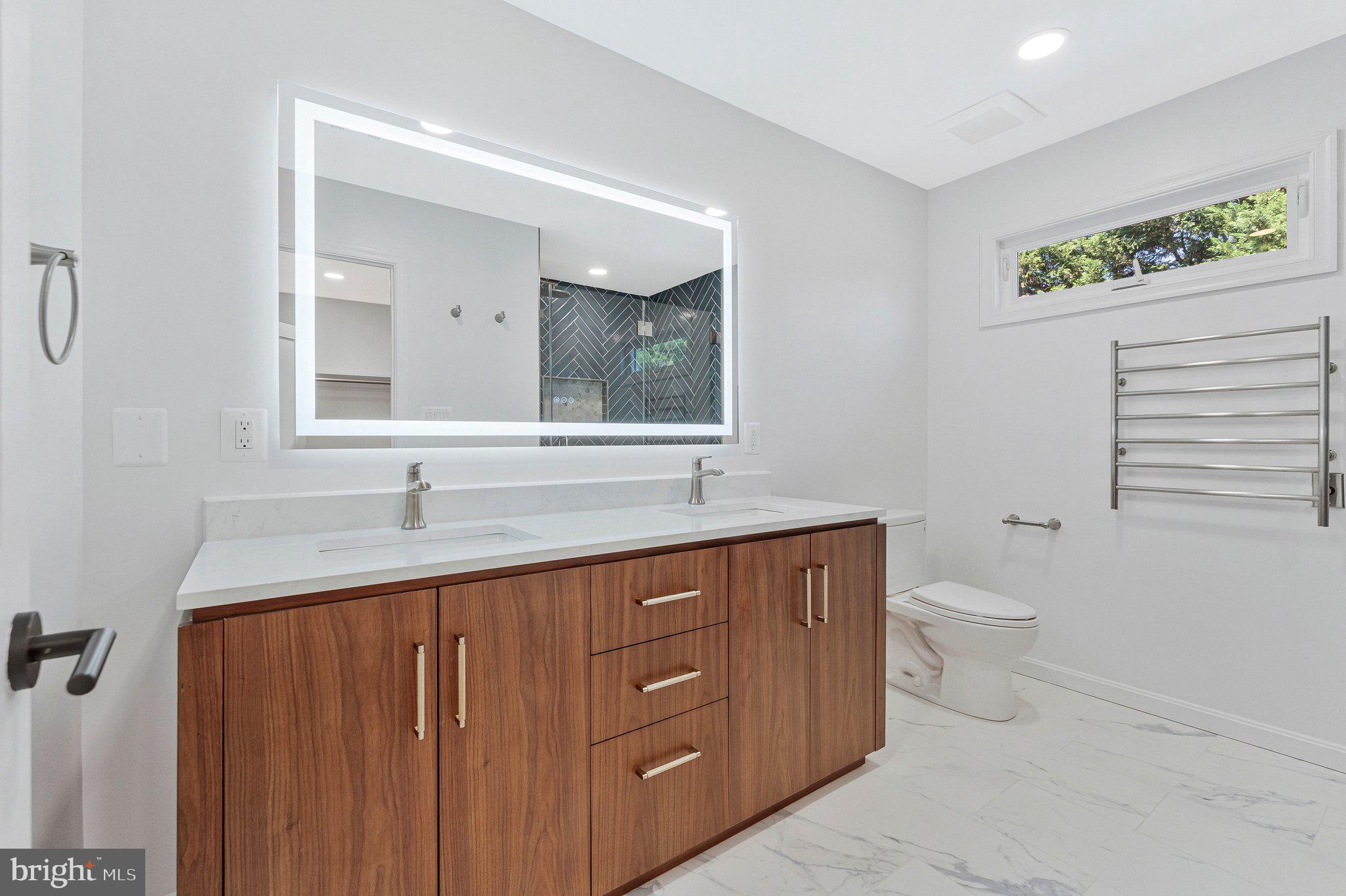 7730 Falstaff Road McLean, VA 22102 - Photo 38 of 83 Newly renovated primary bathroom with towel warmer