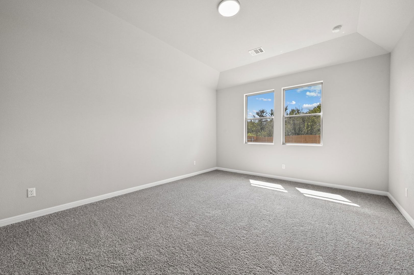 174 Hornet Street Elgin, TX 78621 - Photo 12 of 36 an empty room with a window