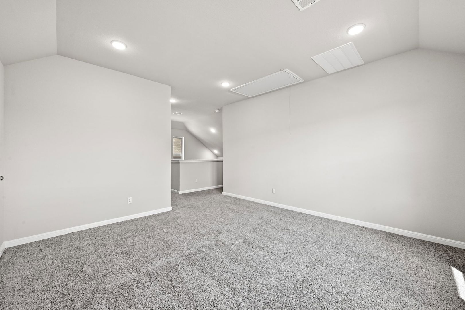 174 Hornet Street Elgin, TX 78621 - Photo 19 of 36 an empty room with a kitchen