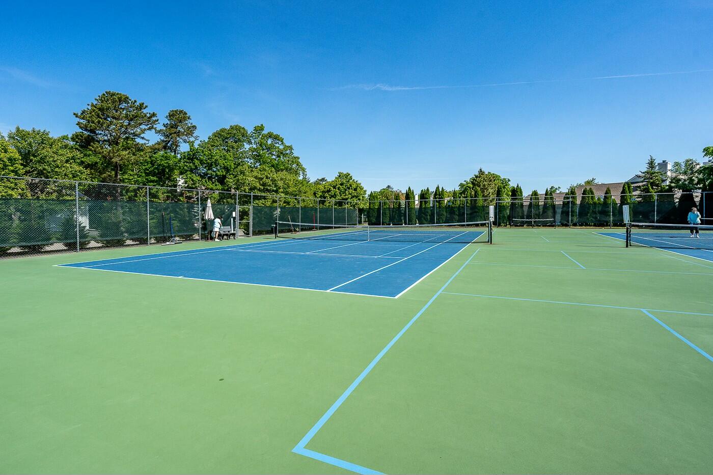 27 Grey Hawk Drive Mashpee, MA 02649 - Photo 38 of 40 a view of an outdoor space and tennis court