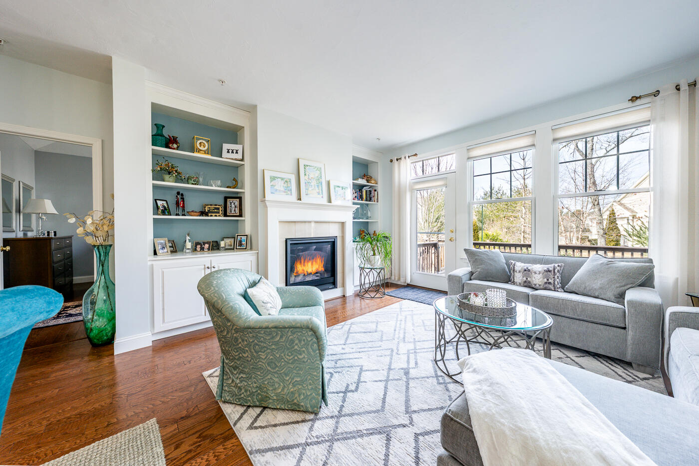 27 Grey Hawk Drive Mashpee, MA 02649 - Photo 7 of 40 a living room with furniture and a fireplace