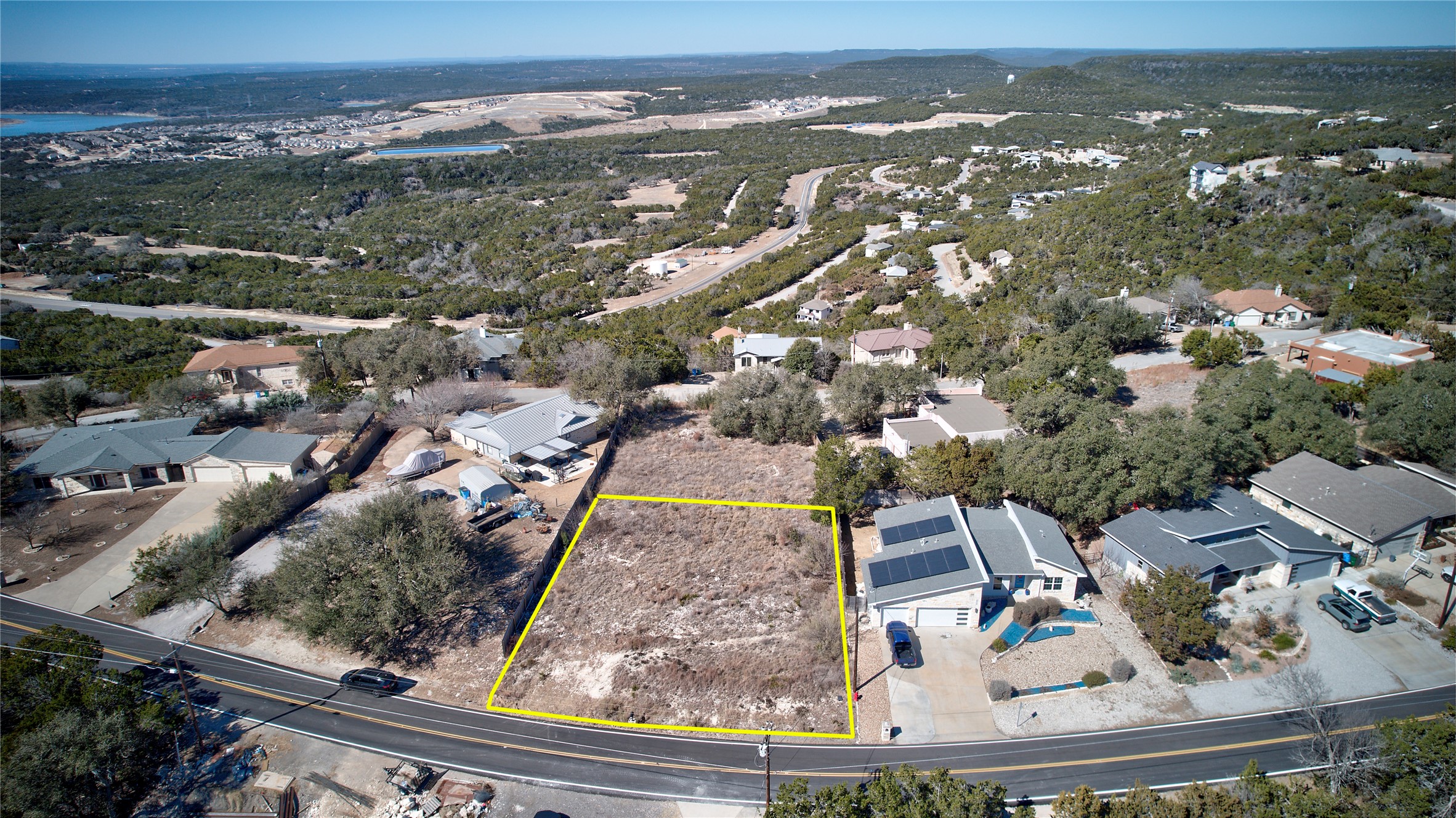 an aerial view of residential houses with outdoor space