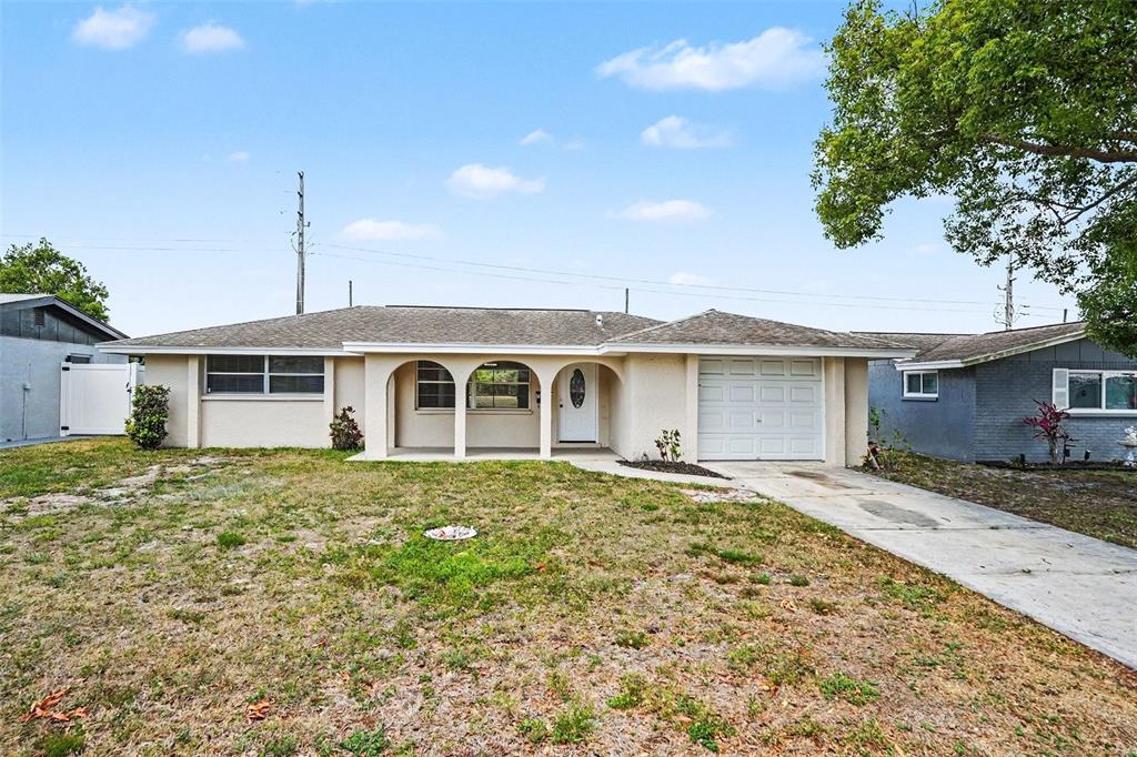 7037 Magnolia Valley Drive New Port Richey, FL 34653 - Photo 1 of 19