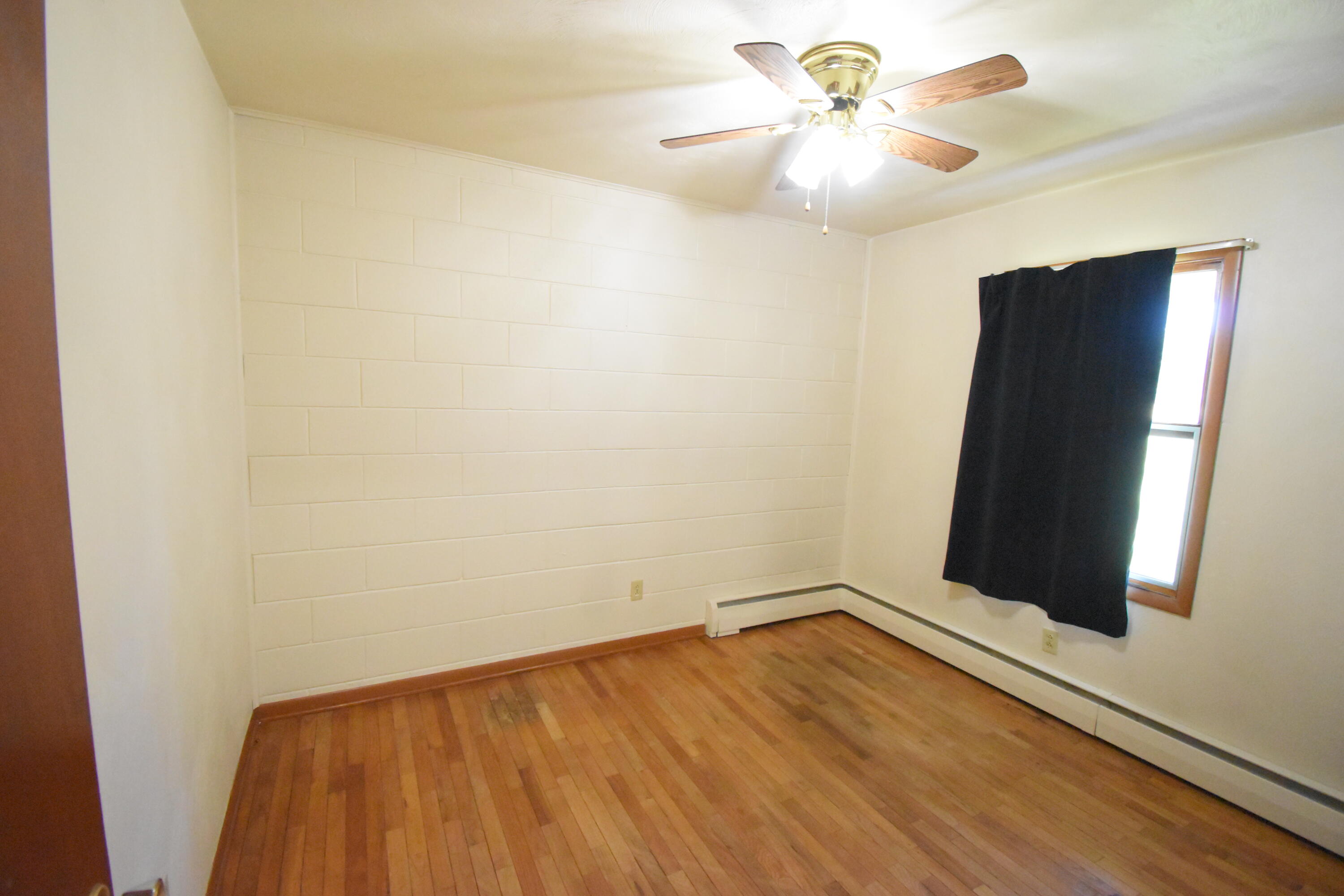 981 East Washington Street Rensselaer, IN 47978 - Photo 9 of 21 wooden floor in an empty room