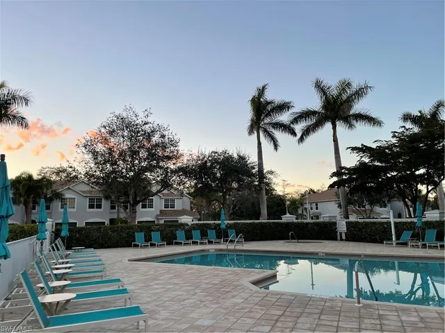 a view of a yard and front view of a house