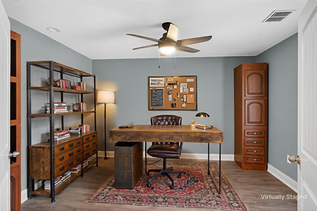 720 Haggerty Road Karnack, TX 75661 - Photo 9 of 39 a view of a workspace with furniture