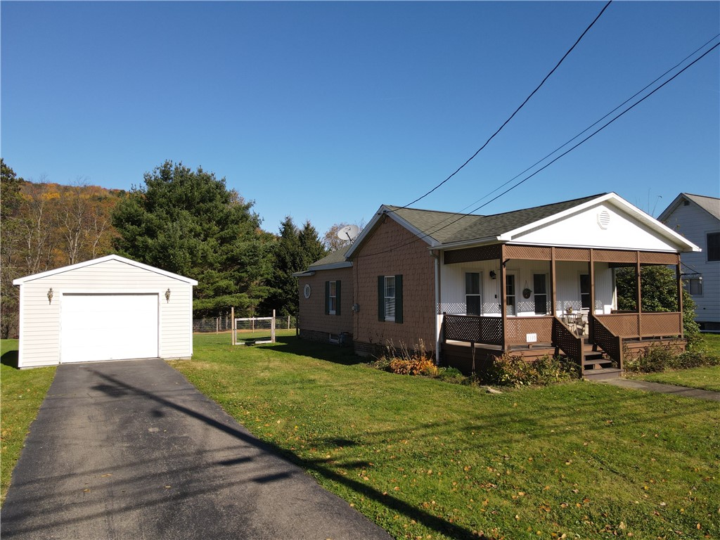 1105 East Honeoye Street Shinglehouse, PA 16748 - Photo 1 of 1 Ranch home with detached garage with blacktop driv