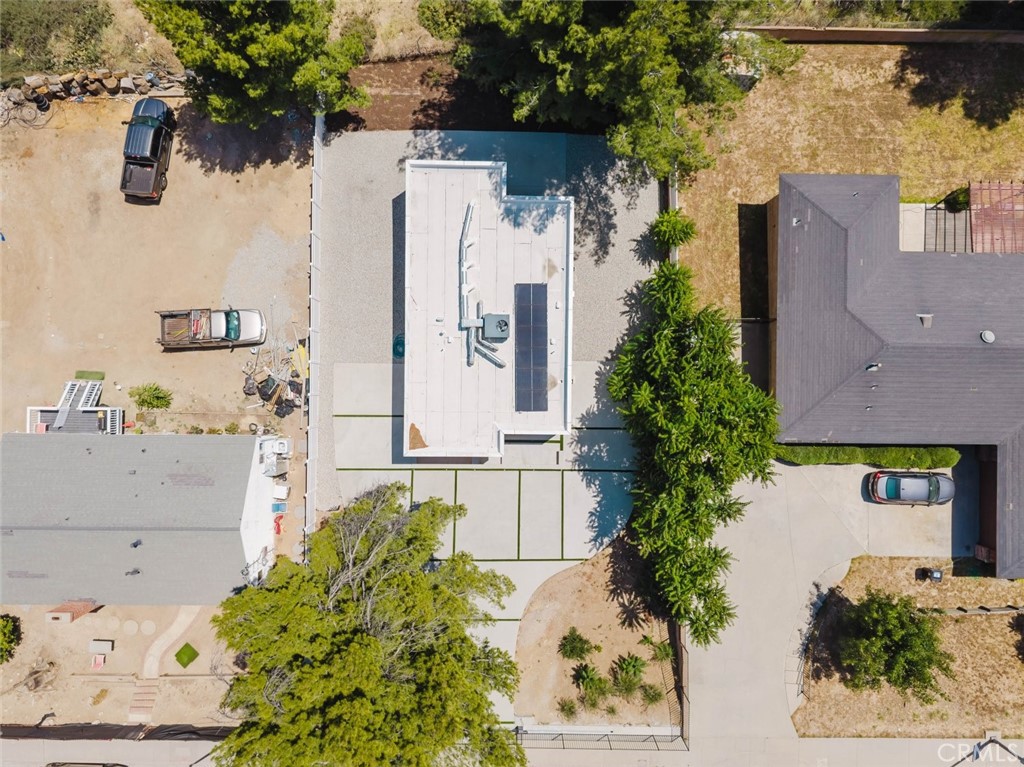 17846 Rinaldi Street Granada Hills, CA 91344 - Photo 33 of 34 aerial view of a house with a yard and potted plants