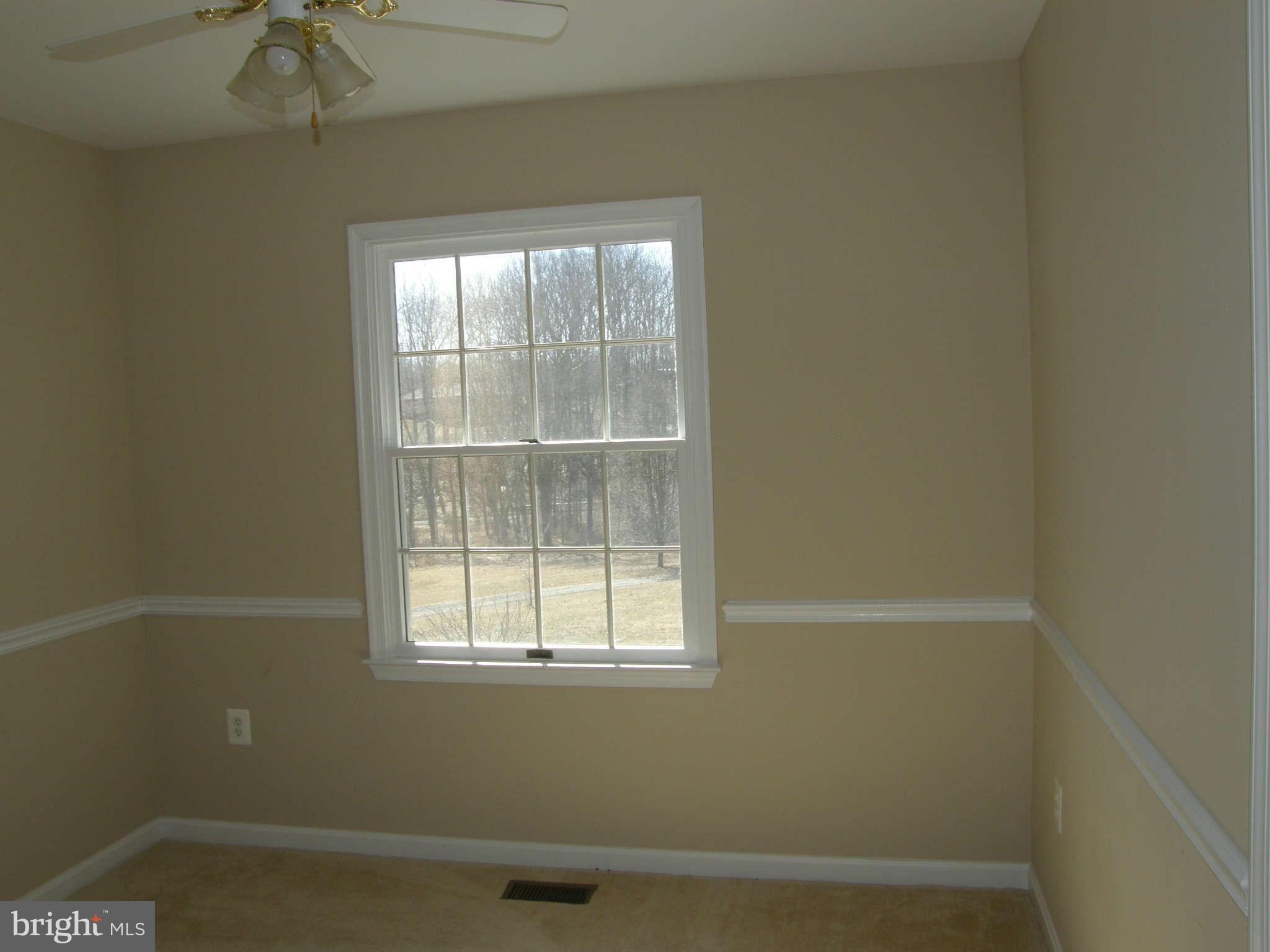 8230 Old Stillhouse Road Rixeyville, VA 22737 - Photo 17 of 30 an empty room with a window