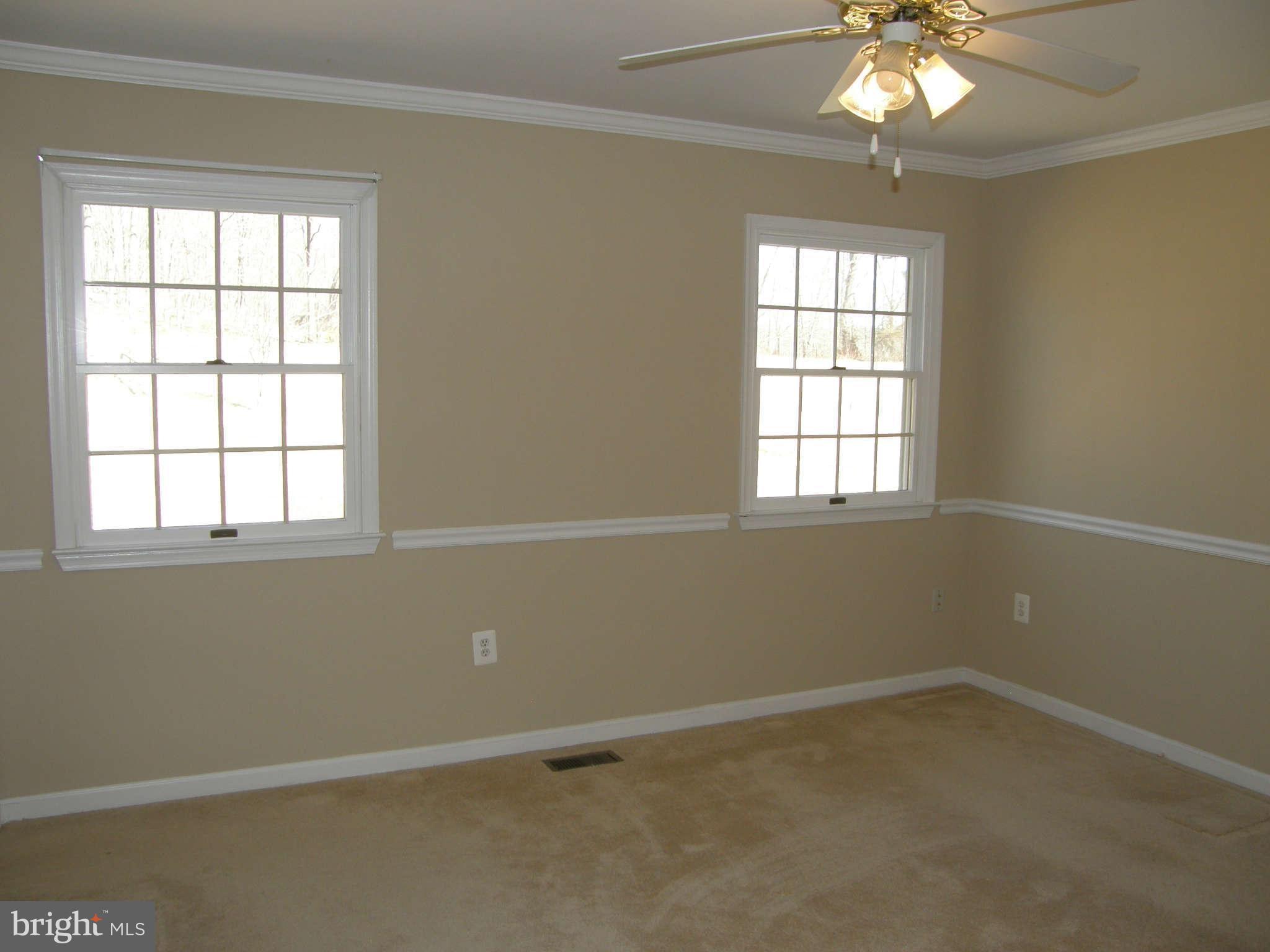 8230 Old Stillhouse Road Rixeyville, VA 22737 - Photo 18 of 30 an empty room with a window