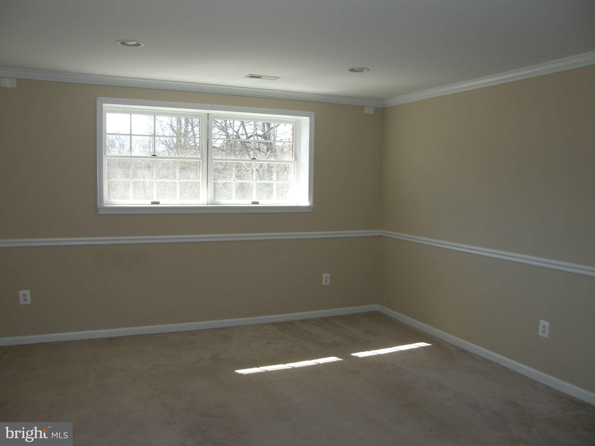 8230 Old Stillhouse Road Rixeyville, VA 22737 - Photo 21 of 30 an empty room with a window