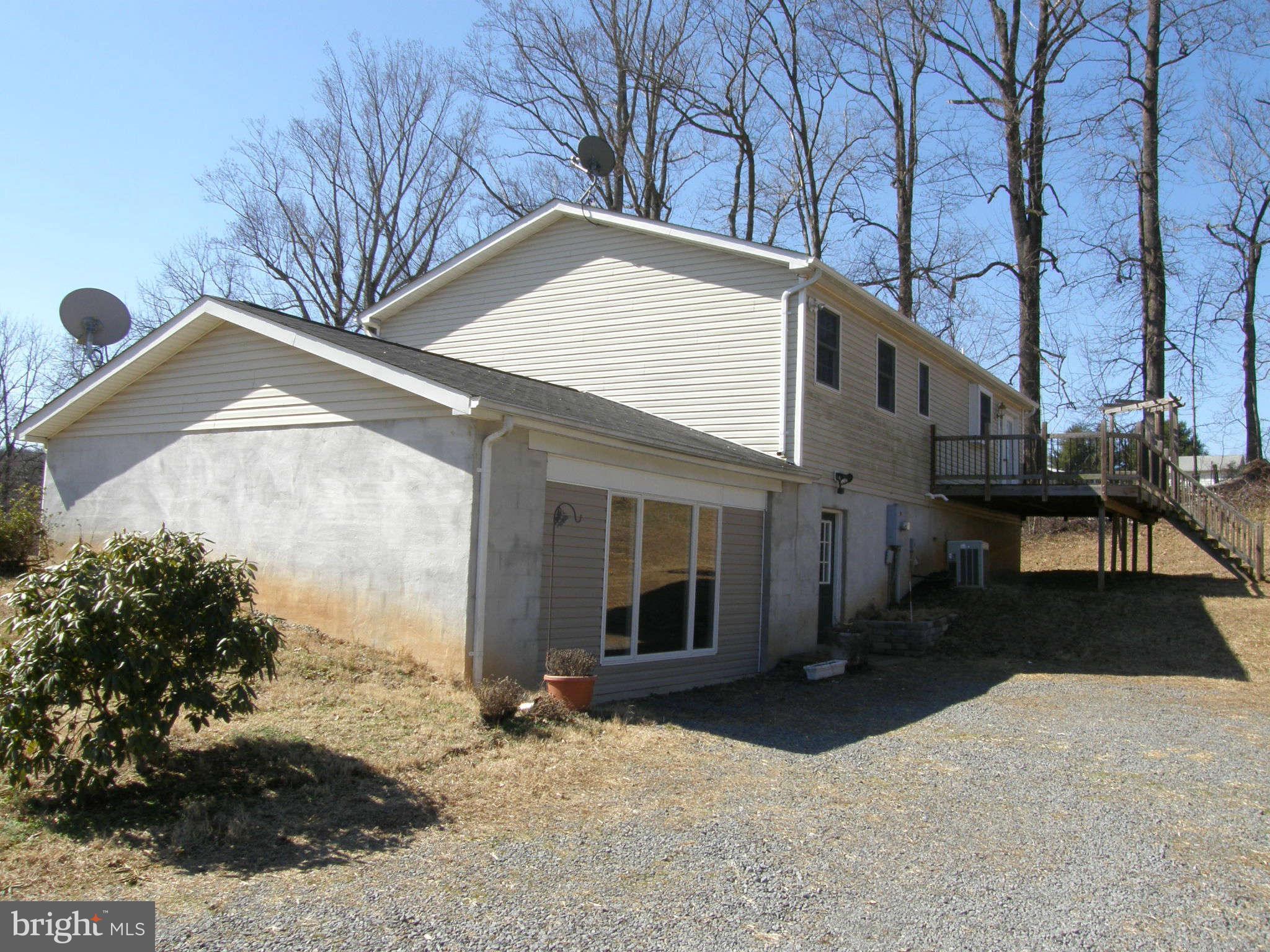 8230 Old Stillhouse Road Rixeyville, VA 22737 - Photo 27 of 30 a view of a house with a yard