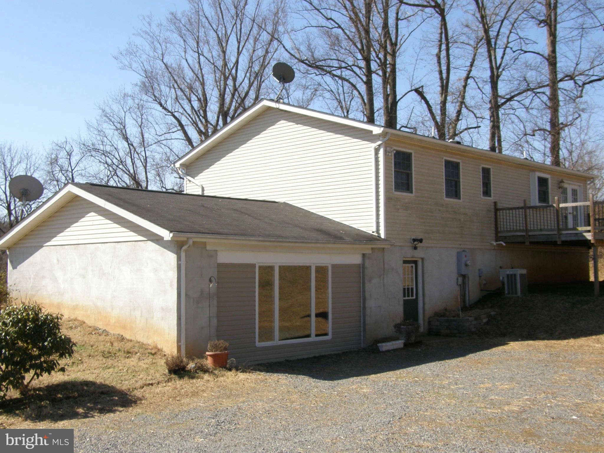 8230 Old Stillhouse Road Rixeyville, VA 22737 - Photo 28 of 30 a view of a house with a snow on the road