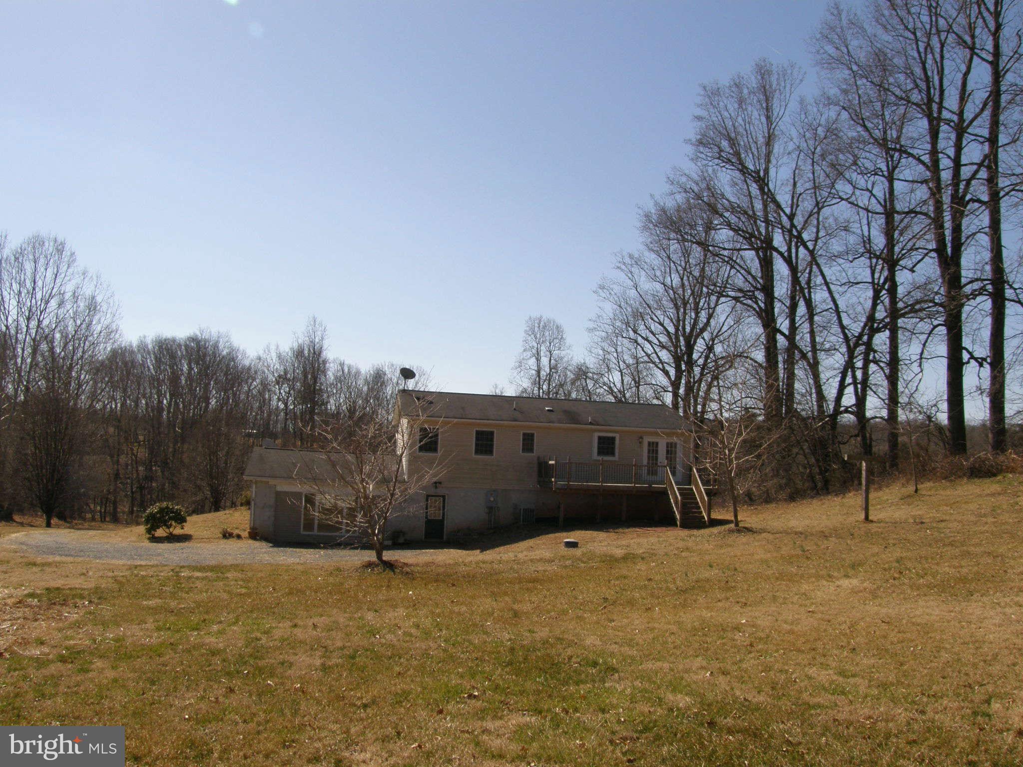 8230 Old Stillhouse Road Rixeyville, VA 22737 - Photo 29 of 30 a view of a house with a yard