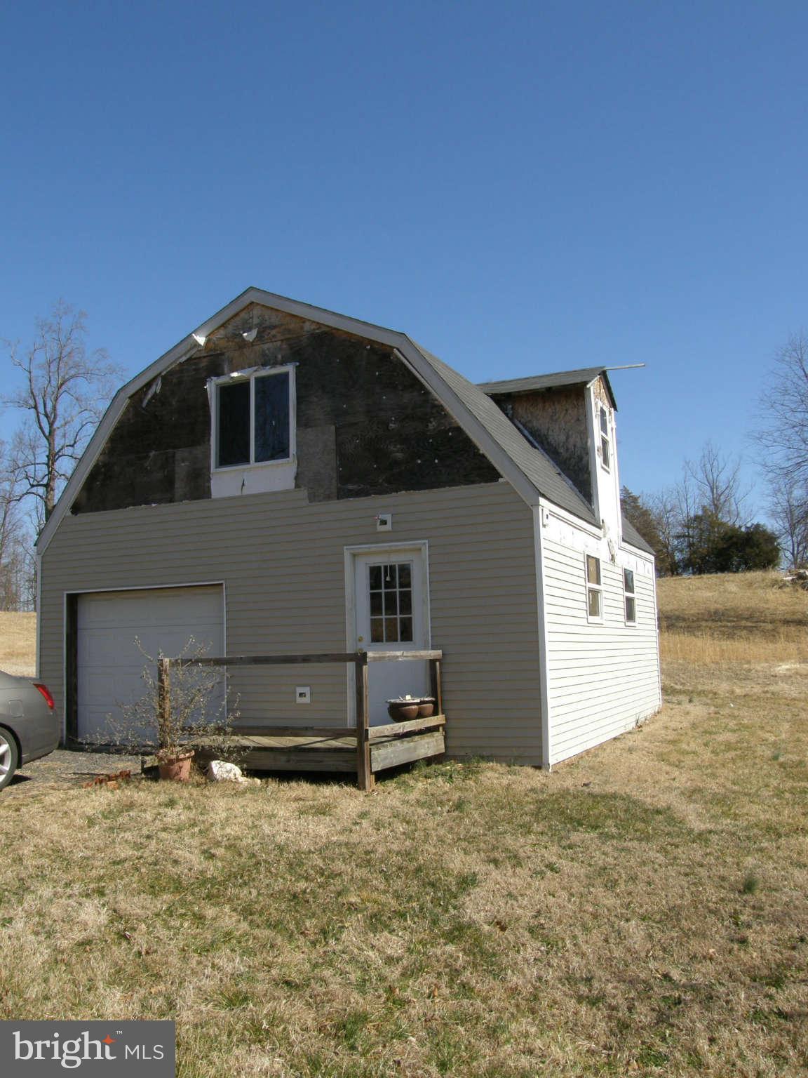 8230 Old Stillhouse Road Rixeyville, VA 22737 - Photo 30 of 30 a front view of a house with a yard