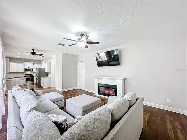 a view of a swimming pool with a sitting area
