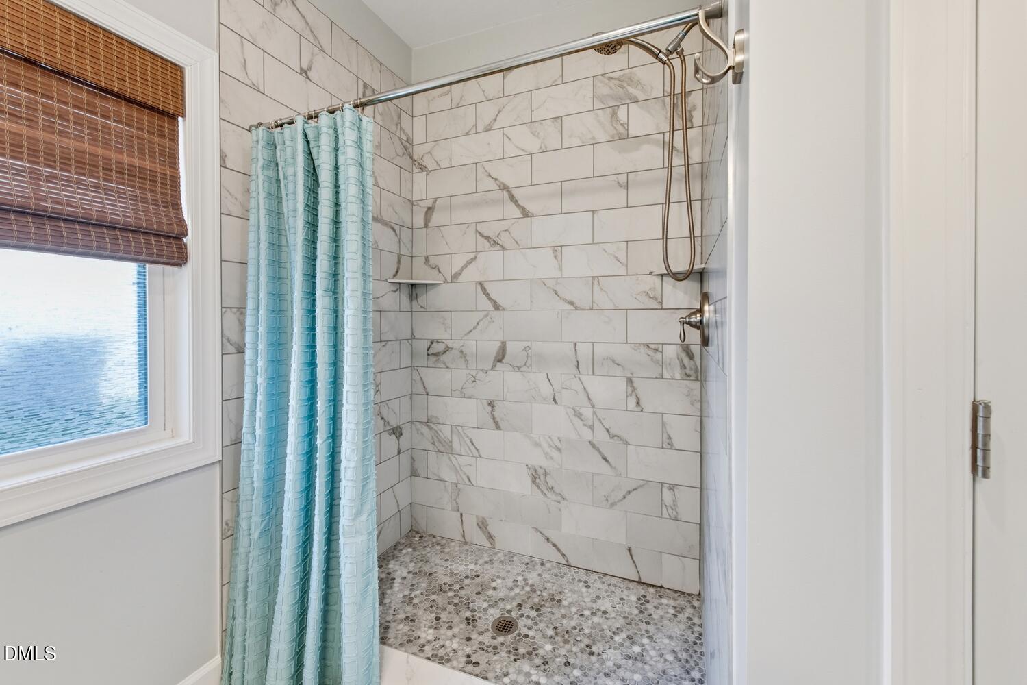 217 Moline Street Durham, NC 27707 - Photo 8 of 30 a bathroom with a shower