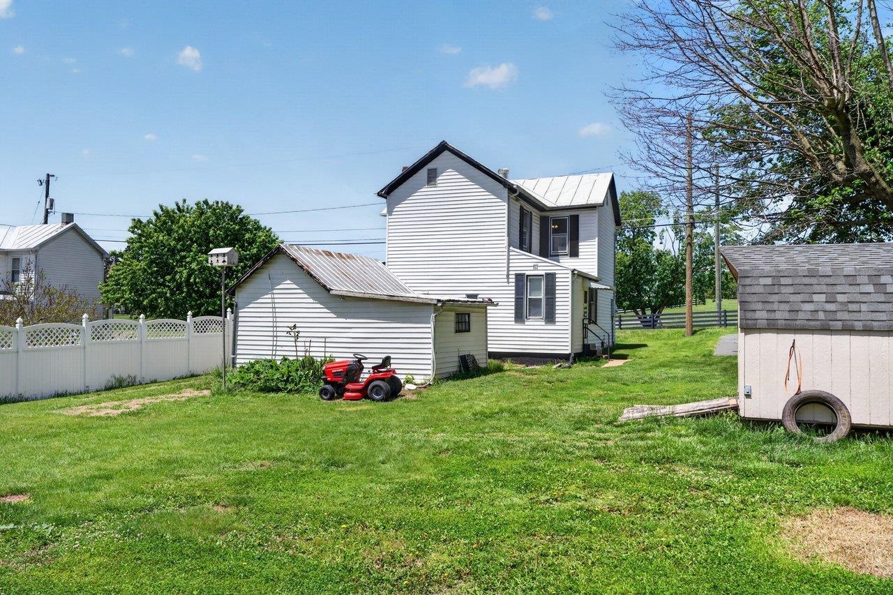 724 Newtown Road Elkton, VA 22827 - Photo 38 of 38 a front view of house with yard and green space