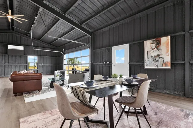 a kitchen with granite countertop cabinets stainless steel appliances a sink and a counter top space