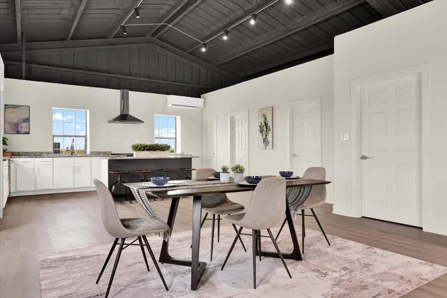 a kitchen with granite countertop counter space a sink appliances and cabinets
