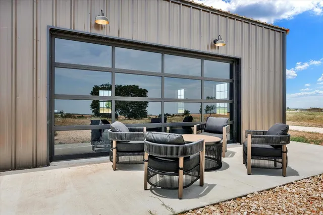 a workspace with furniture and window