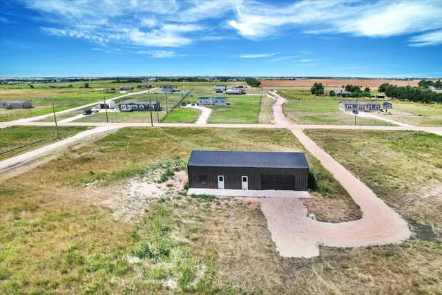 a view of a swimming pool with an ocean view