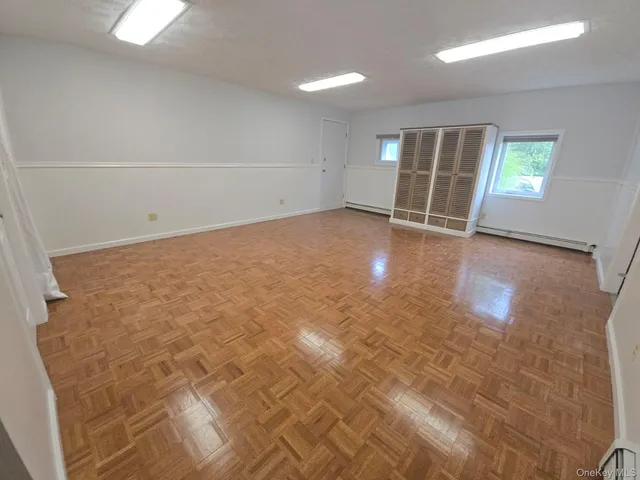 an empty room with windows