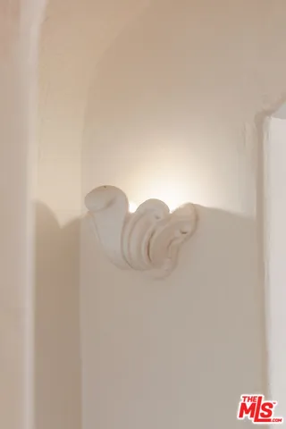 a close up of a white wall